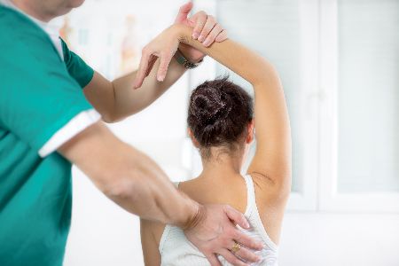 Woman Receiving Therapy for Shoulder Pain